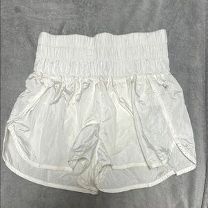 White Athletic Shorts with Elastic Waistband and Curved Hem